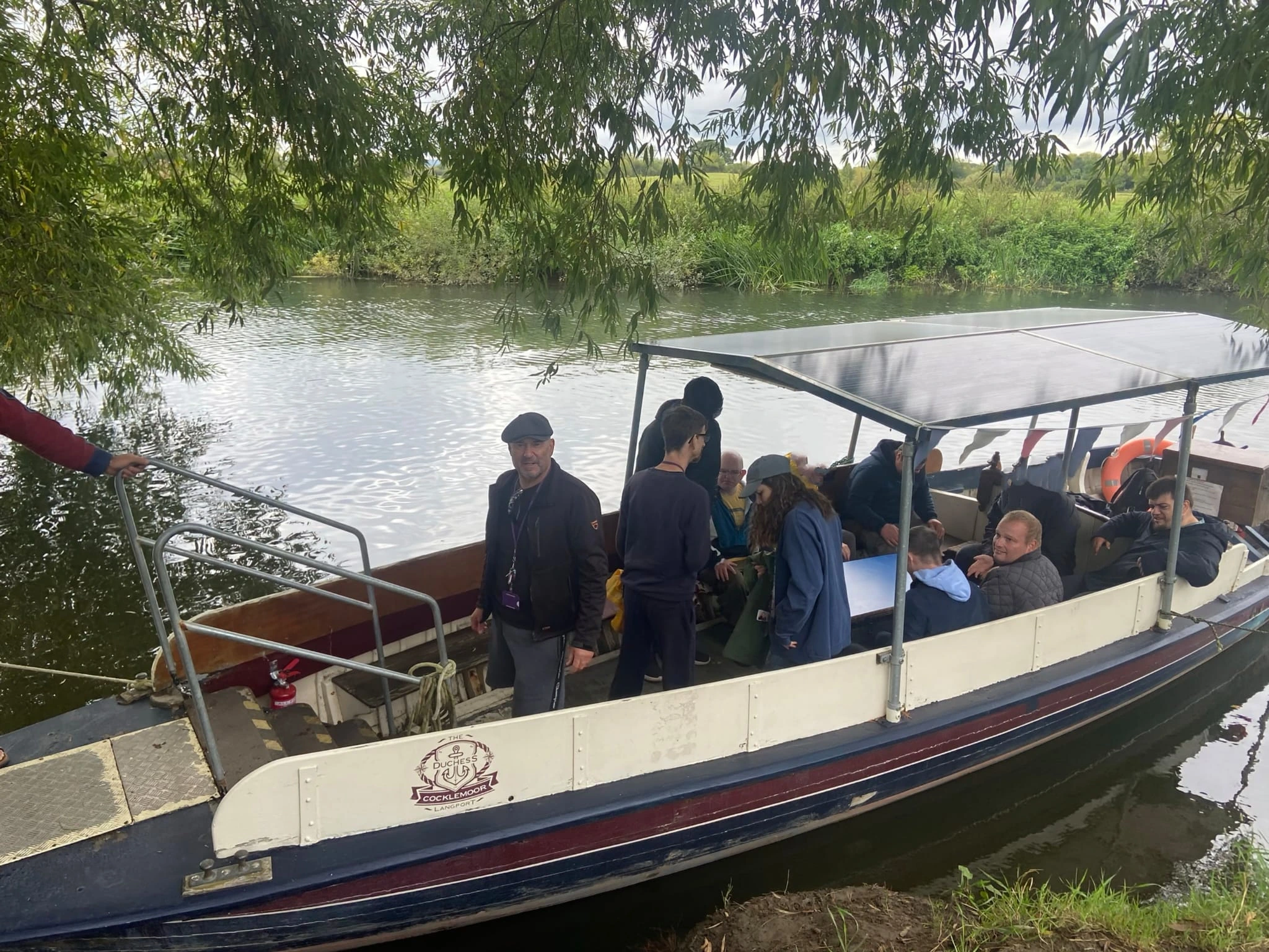 Learners taking a river cruise
